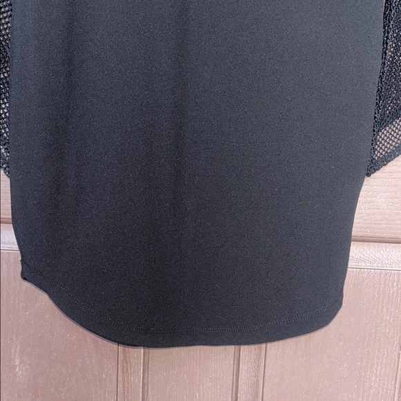 Elegant Black Dress with Floral Accents - Picture 3 of 13